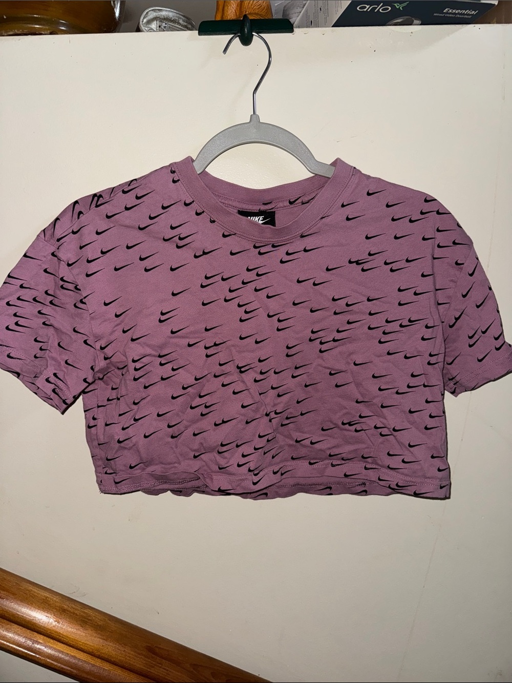 Nike Mauve Crop Tee with Black Swoosh Pattern